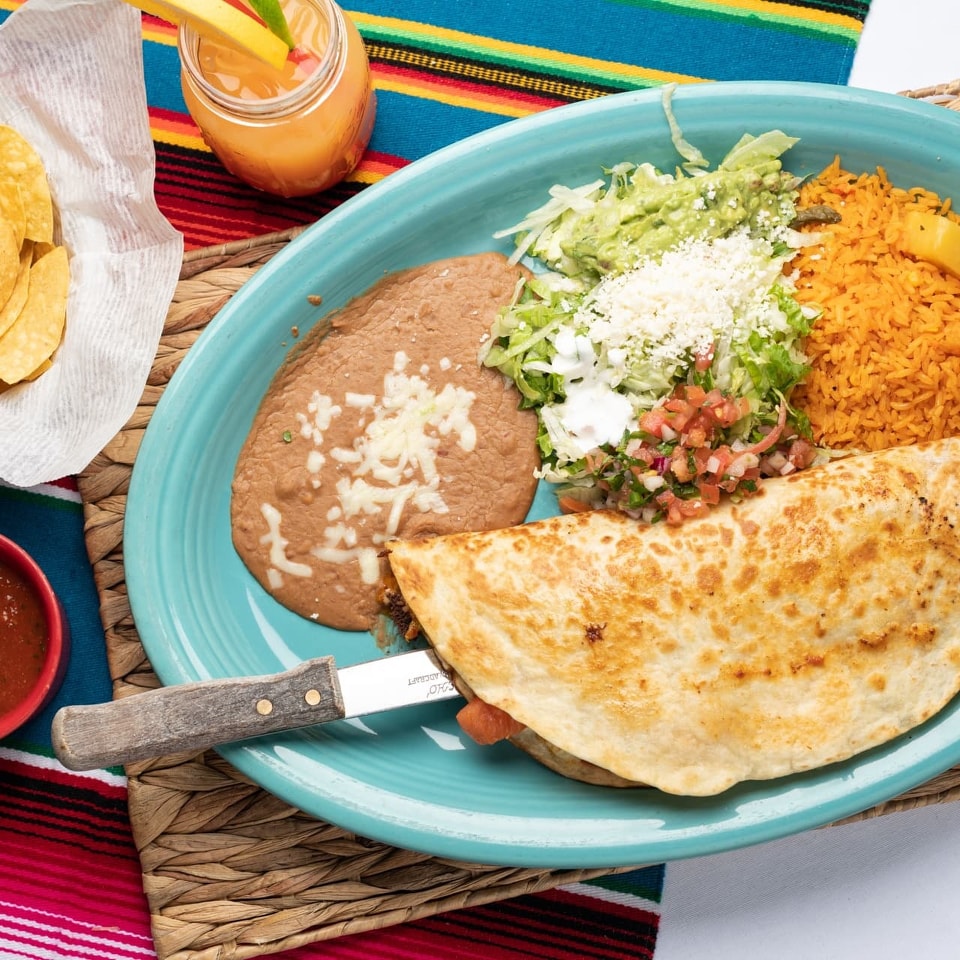 Fajita Quesadilla, Refreid Beans, Mexican Rice, Guacamole Salad, Fresh Chips